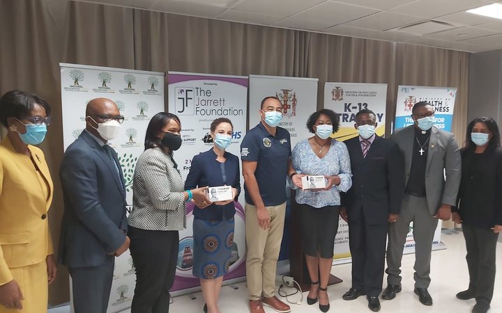 The face mask handover ceremony in Jamaica with government ministers